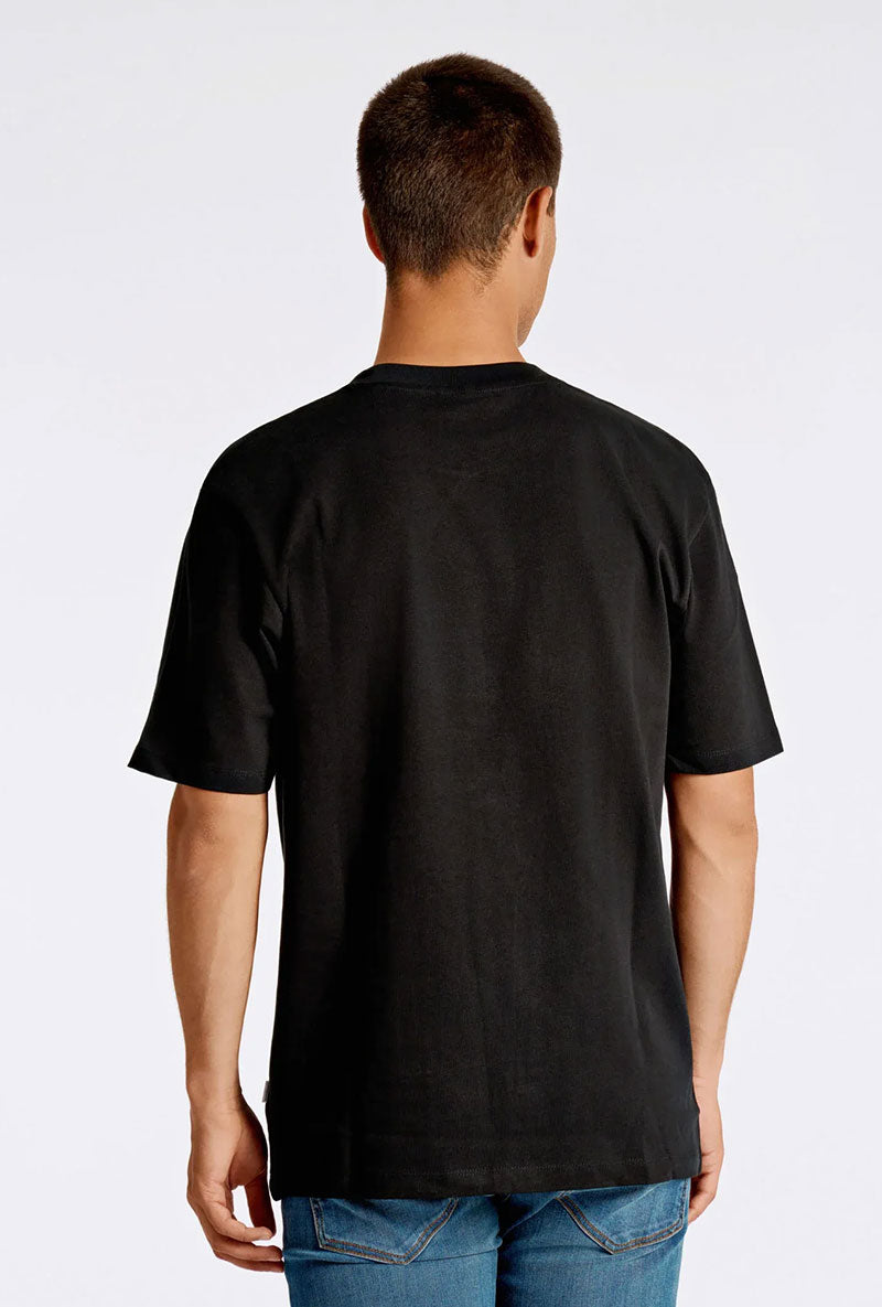 Back image of a model wearing Oneck oversize tshirt in black, by brand Lindbergh
