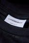 Front image of the Oneck oversize tshirt in black, by brand Lindbergh