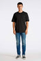 Front image of a model wearing the Oneck oversize tshirt in black, by brand Lindbergh