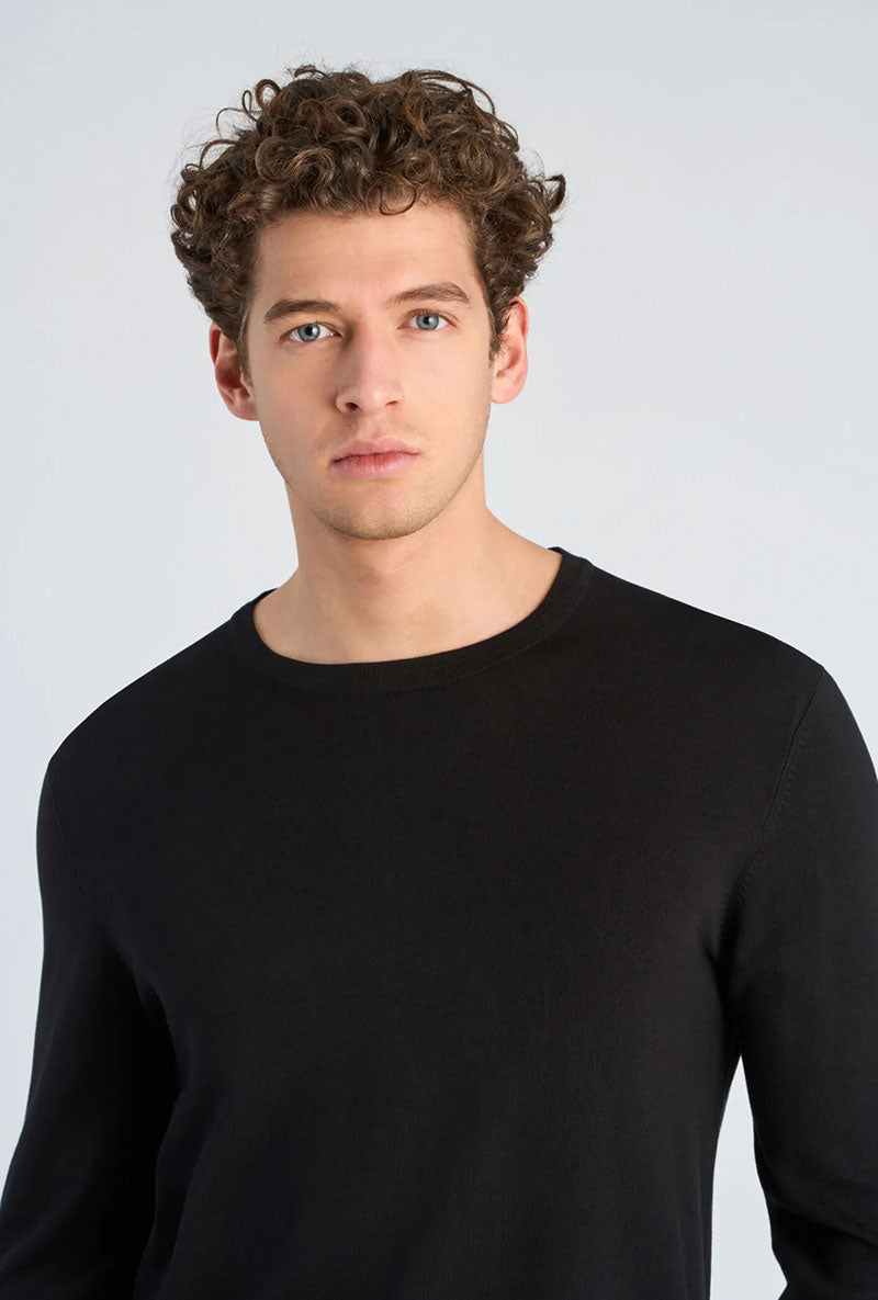 Front image of a model wearing Soft viscose blend oneck knit in black, by brand Lindbergh