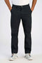 Front image of a model wearing Superflex chino pants in black, by brand Lindbergh