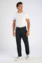 Front image of a model wearing the Superflex chino pants in black, by brand Lindbergh