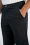 Front image of a model wearing the Superflex chino pants in black, by brand Lindbergh