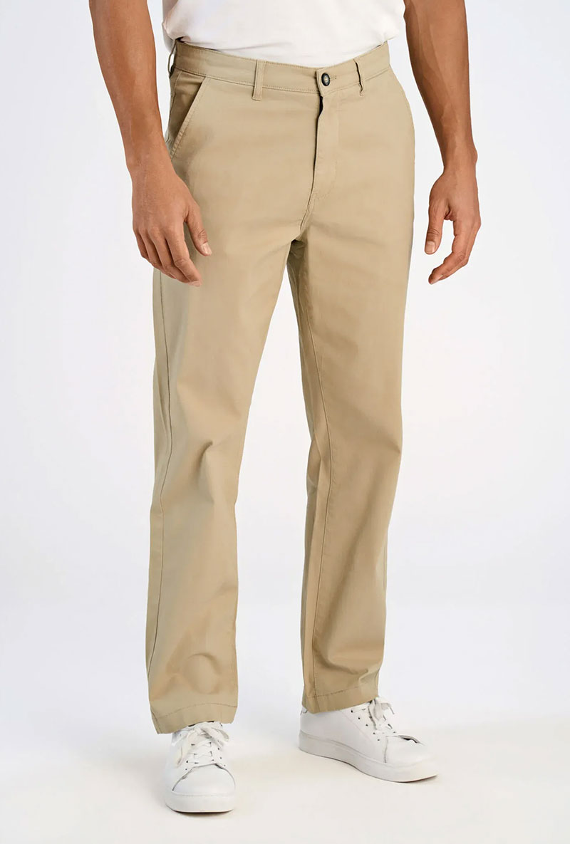 Front image of a model wearing Superflex chino pants in sand, by brand Lindbergh