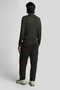 Back image of a model wearing the Lyle and scott cargo pocket trousers in black, by brand Lyle and scott
