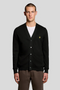 Front image of a model wearing the Lyle and scott merino v neck cardigan in black, by brand Lyle and scott