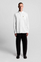 Front image of a model wearing Lyle and scott plain oxford shirt in white, by brand Lyle and scott