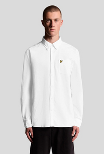 Front image of a model wearing the Lyle and scott plain oxford shirt in white, by brand Lyle and scott