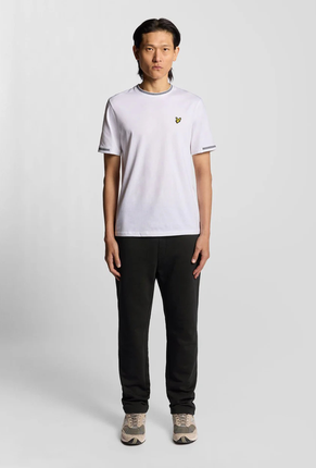 Front image of a model wearing Lyle and scott straight leg jogger in black, by brand Lyle and scott