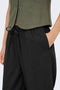Front image of a model wearing the Goa mw linen pull up culotte pants in black, by brand Only