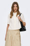 Front image of a model wearing Goa s/s linen shirt in off white, by brand Only