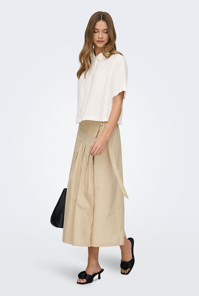 Front image of a model wearing Goa s/s linen shirt in off white, by brand Only