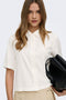 Front image of a model wearing the Goa s/s linen shirt in off white, by brand Only