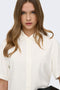 Front image of a model wearing the Goa s/s linen shirt in off white, by brand Only