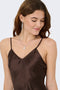 Front image of a model wearing the Losiris long strap dress in brown, by brand Only
