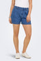 Front image of a model wearing Luka mw chino denim shorts in denim, by brand Only
