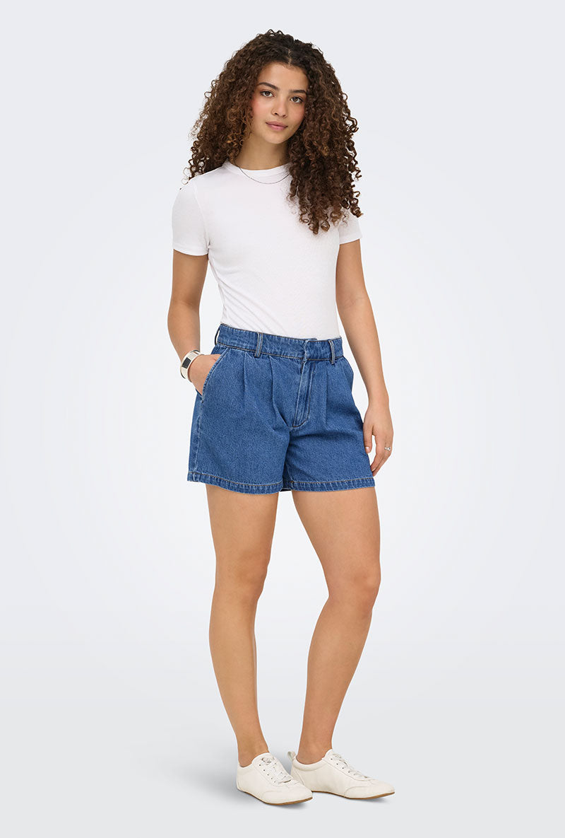 Front image of a model wearing Luka mw chino denim shorts in denim, by brand Only