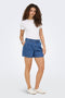 Front image of a model wearing the Luka mw chino denim shorts in denim, by brand Only