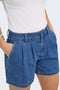 Front image of a model wearing the Luka mw chino denim shorts in denim, by brand Only