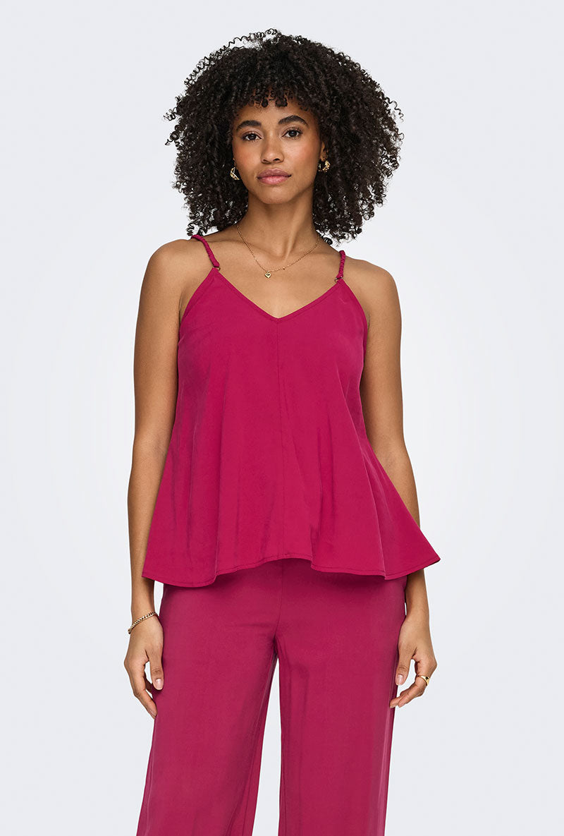 Front image of a model wearing Madeli oaklyn strap top in fuschia, by brand Only