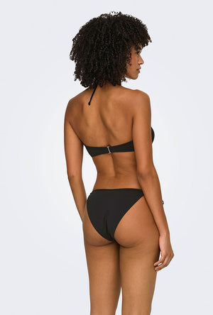 Back image of a model wearing the Marseille tie string bikini bottom in black, by brand Only