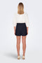 Back image of a model wearing the Only nova life talia shorts in navy, by brand Only