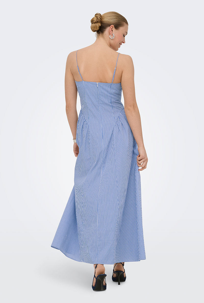 Back image of a model wearing Tiari strap hip dress in blue, by brand Only