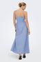 Back image of a model wearing the Tiari strap hip dress in blue, by brand Only