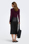 Back image of a model wearing the Bitten faux leather pencil skirt in black, by brand Only