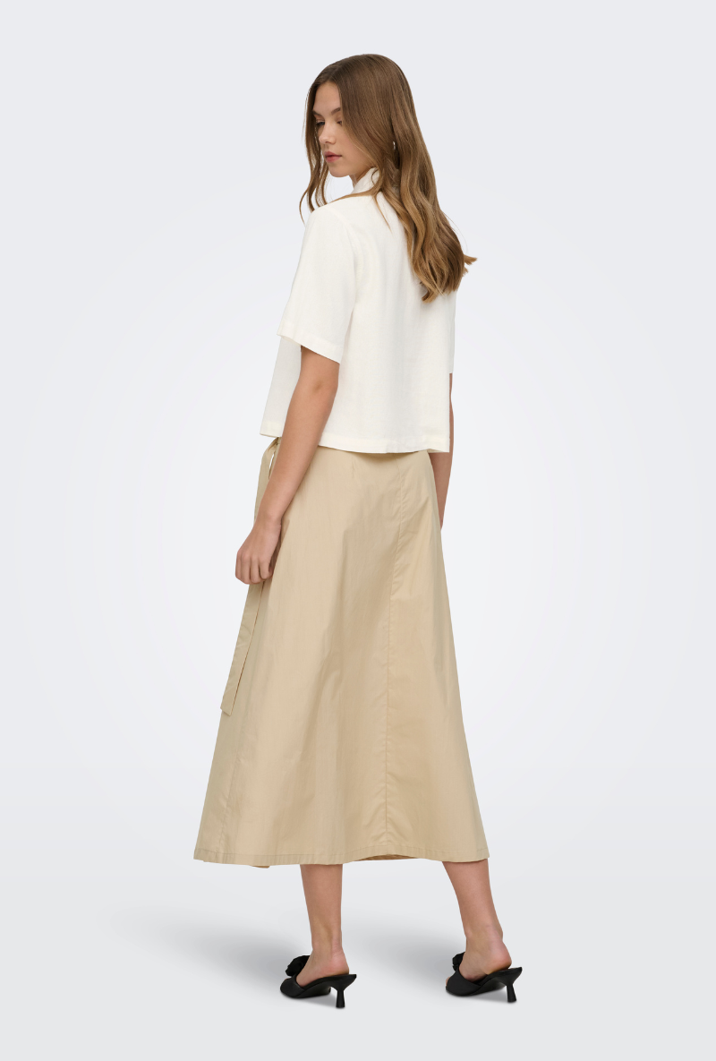 Back image of a model wearing Goa shortsleeve linen shirt in off white, by brand Only