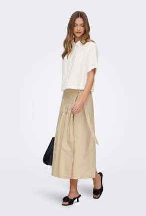 Front image of a model wearing Goa shortsleeve linen shirt in off white, by brand Only