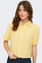 Front image of a model wearing the Goa shortsleeve linen shirt in yellow, by brand Only