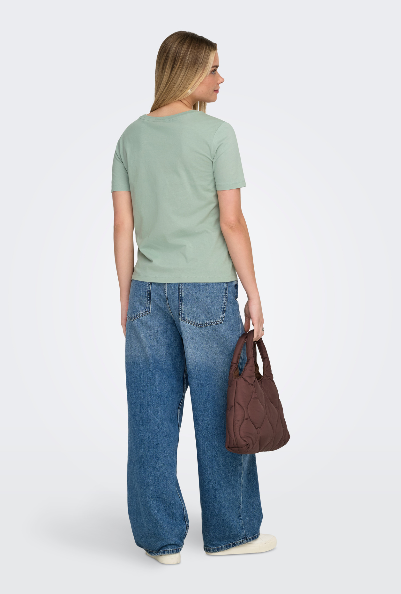 Back image of a model wearing Only happy s/s print top in sage, by brand Only