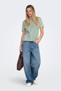 Front image of a model wearing the Only happy s/s print top in sage, by brand Only