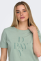 Front image of a model wearing the Only happy s/s print top in sage, by brand Only