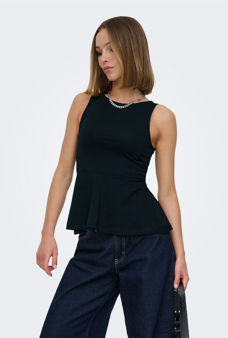 Front image of a model wearing Kiss sleeveless peplum top in black, by brand Only