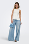 Front image of a model wearing Kiss sleeveless peplum top in white, by brand Only