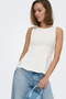 Front image of a model wearing the Kiss sleeveless peplum top in white, by brand Only