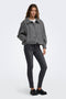 Front image of a model wearing the Lasta high collar bomber jacket in charcoal, by brand Only