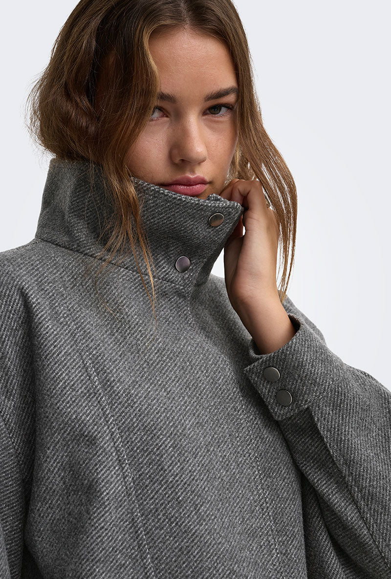 Front image of a model wearing Lasta high collar bomber jacket in charcoal, by brand Only