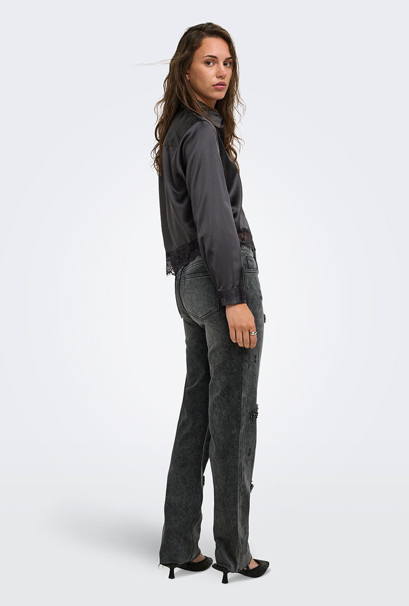 Back image of a model wearing Lindona l/s satin lace shirt in black, by brand Only