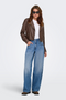 Front image of a model wearing Only taylor barrel jeans in denim, by brand Only