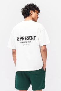 Back image of a model wearing the Owners club t in off white, by brand Represent