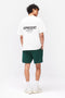 Back image of a model wearing the Owners club t in off white, by brand Represent