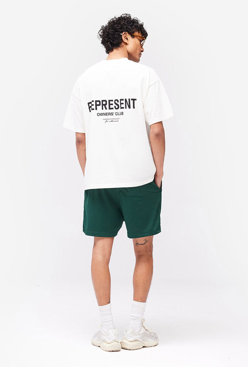 Back image of a model wearing Owners club t in off white, by brand Represent