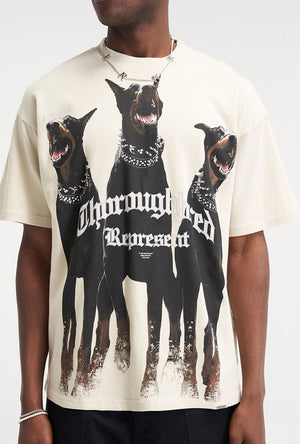 Front image of a model wearing the Thoroughbread t in off white, by brand Represent