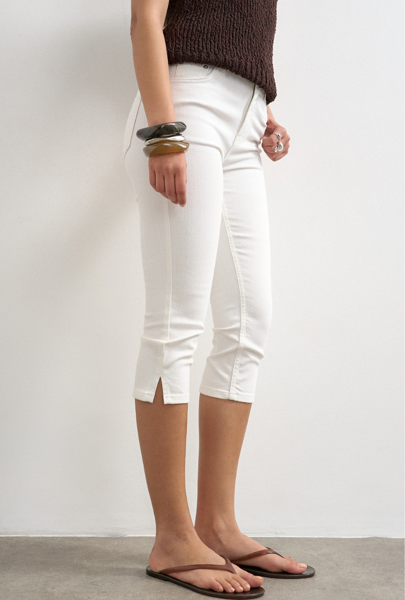 Front image of Camilla highrise denim capri in white, by brand Top shop