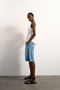 Front image of Mariam sleeveless curve hem top in white, by brand Top shop