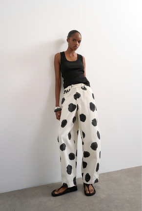 Front image of Yara highrise dot barrel trousers in white, by brand Top shop