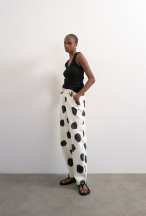 Front image of the Yara highrise dot barrel trousers in white, by brand Top shop